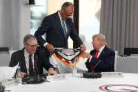 Merzas Vokietija Trumpas JAV G7 Dovana